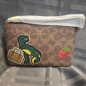 Coach Brown Wristlet with Dinosaur and Strawberry Patches
